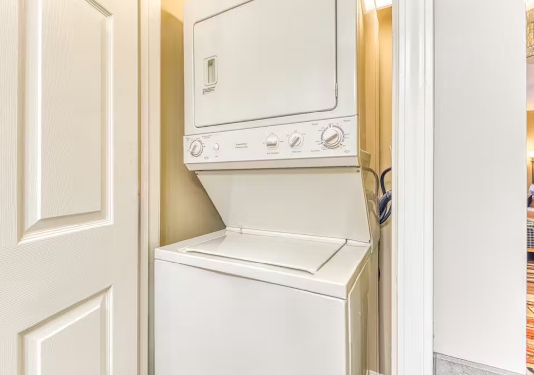 Your private laundry closet features a stackable washer and dryer, making it easy to keep your clothes fresh during your stay.