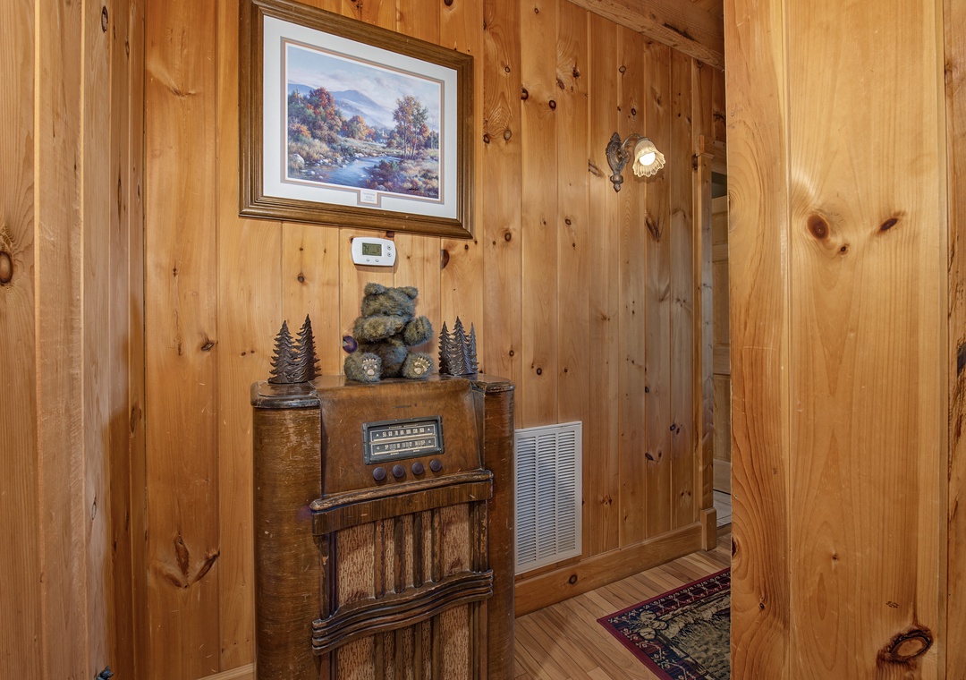 Rustic charm welcomes you at the entrance, with warm knotty pine walls and thoughtful touches that set the tone for your relaxing mountain escape.