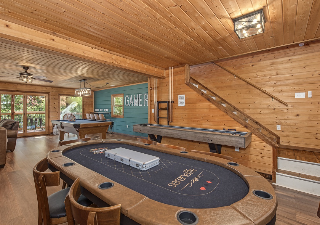 Challenge your friends to a friendly game at the custom poker table, then take on the billiards or shuffleboard table—all under soaring wood-paneled ceilings that bring cabin-style warmth to your gathering.