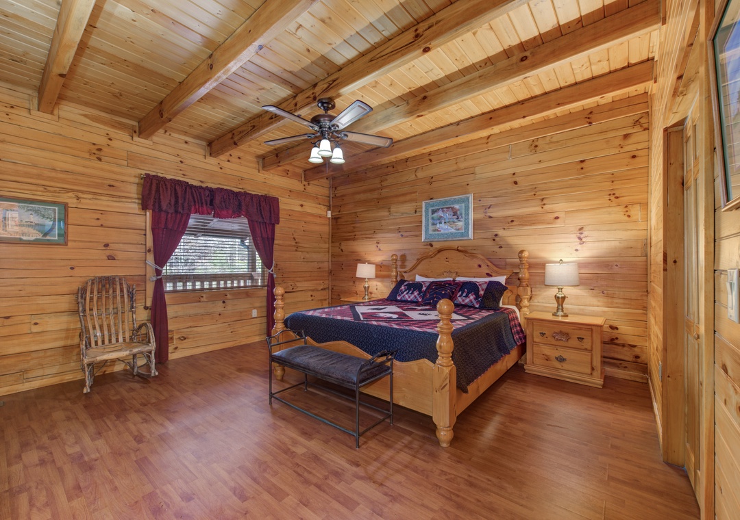 Unwind in your cozy log cabin bedroom with rustic charm, exposed beams, and comfortable furnishings for peaceful mountain retreat nights.