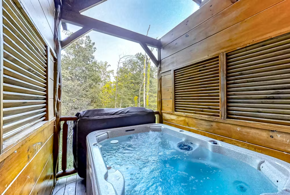 Soak away your stress in your private hot tub, surrounded by warm wood and open sky views.