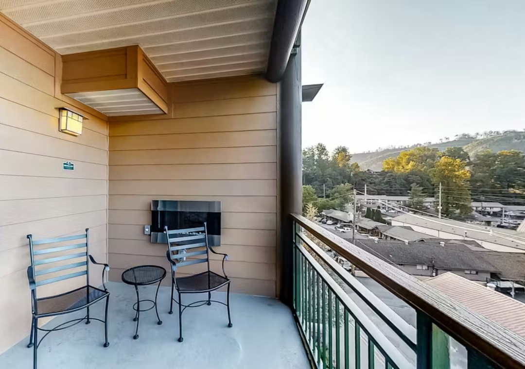 Your private balcony offers a peaceful retreat with comfortable seating and mountain views, perfect for morning coffee or evening relaxation.
