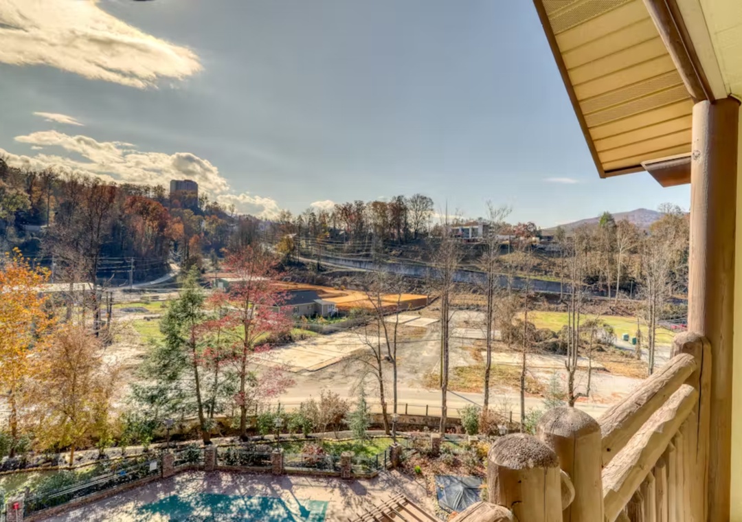 Take in sweeping autumn views from your private balcony, where colorful foliage and rolling hills create a peaceful retreat.