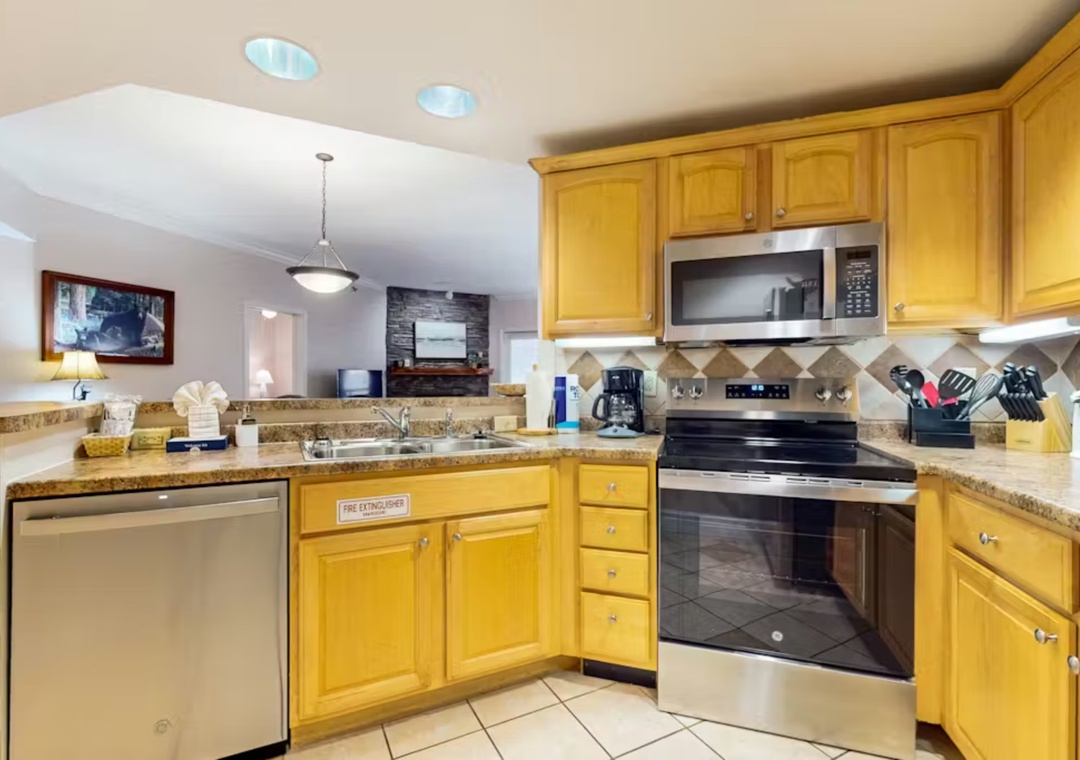 Your fully equipped kitchen features granite countertops and stainless steel appliances, making meal preparation a breeze during your stay.