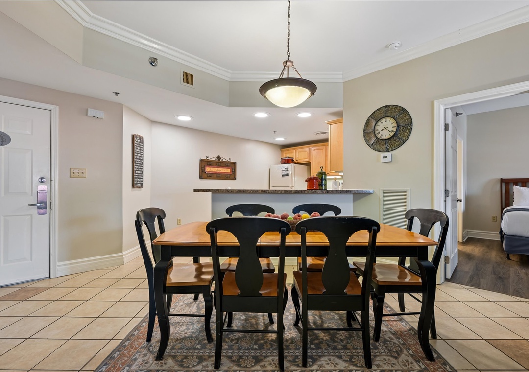 Your spacious dining room flows seamlessly into the modern kitchen, perfect for memorable family meals and vacation conversations.