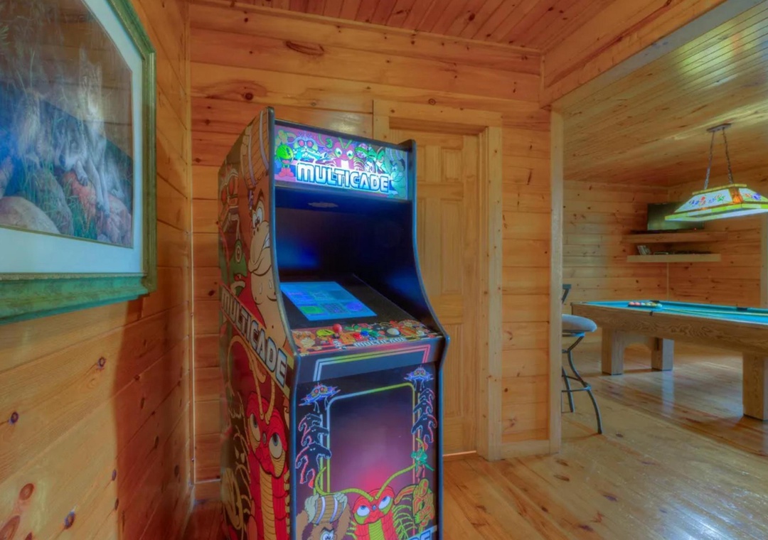 Challenge your travel companions to a friendly arcade showdown in your private game room, complete with classic multicade fun and pool table entertainment.