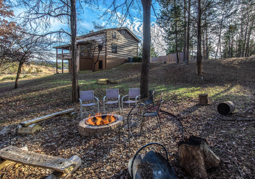 Gather around your private fire pit for cozy evenings under the stars, with comfortable seating and peaceful woodland views.
