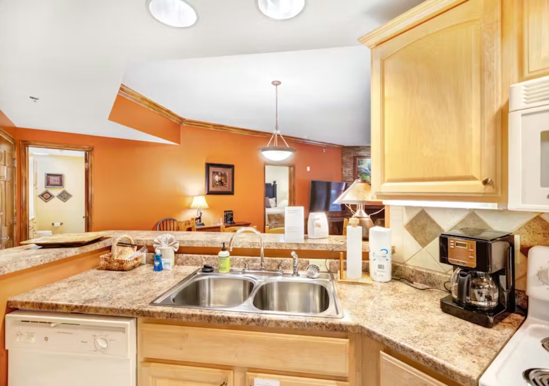 Your fully equipped kitchen features granite counters, modern appliances, and everything you need to prepare delicious meals during your stay.