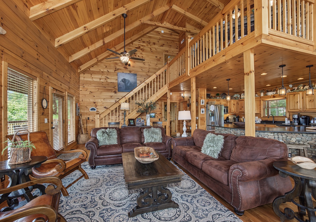 Step into your inviting mountain retreat, where soaring cathedral ceilings, warm wood finishes, and plush leather seating create the perfect space to unwind and connect with loved ones.