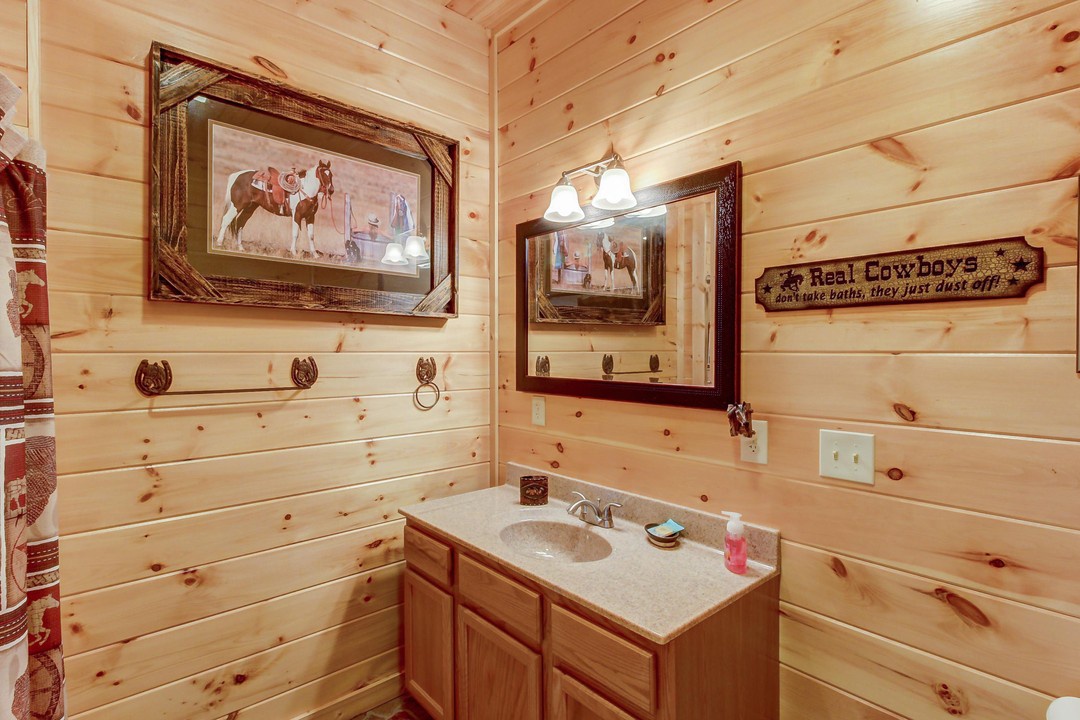 Warm pine walls and rustic Western artwork create an inviting retreat where you can refresh in comfort and style.
