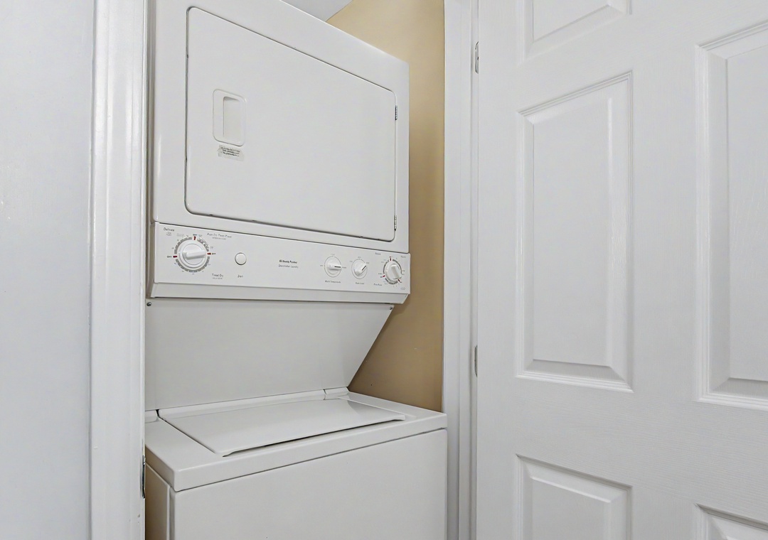 Your in-unit washer and dryer combo tucked neatly into its own closet keeps your clothes fresh throughout your stay.