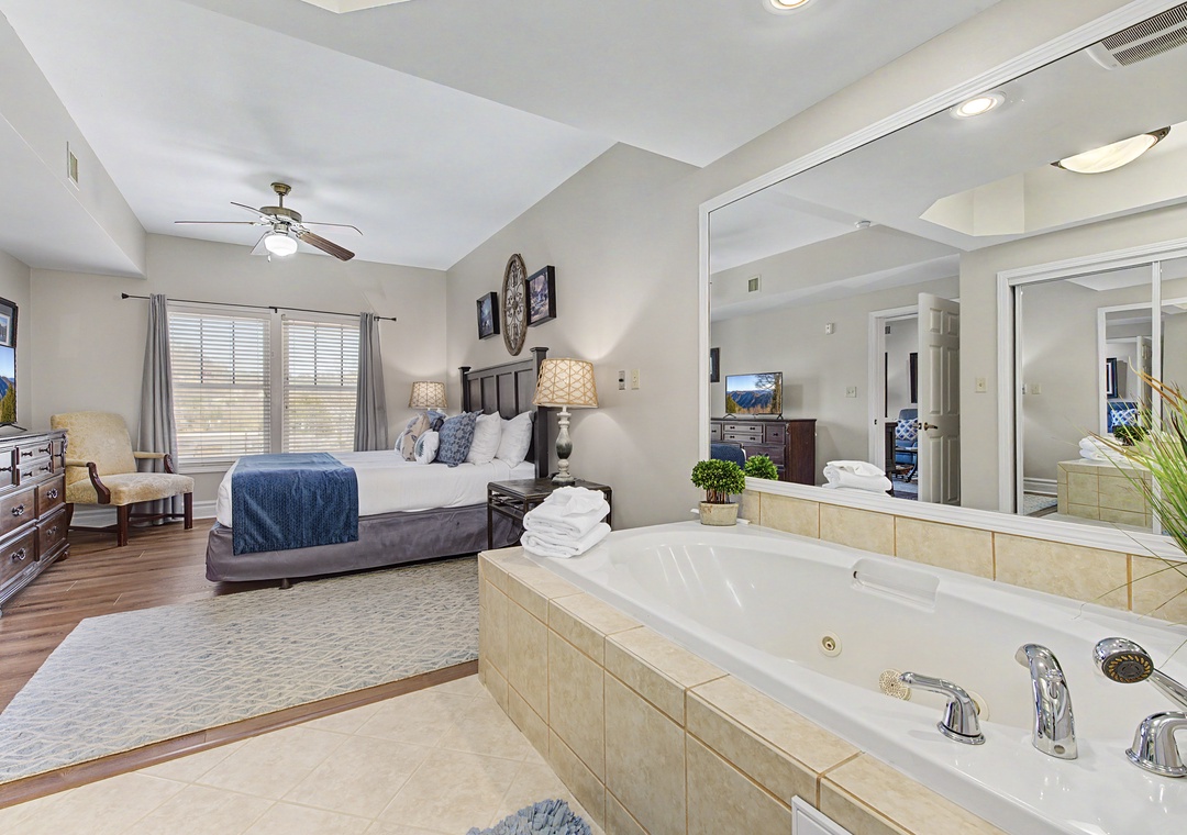 Unwind in your luxurious suite featuring a plush king bed and indulgent jetted tub for the ultimate romantic retreat.