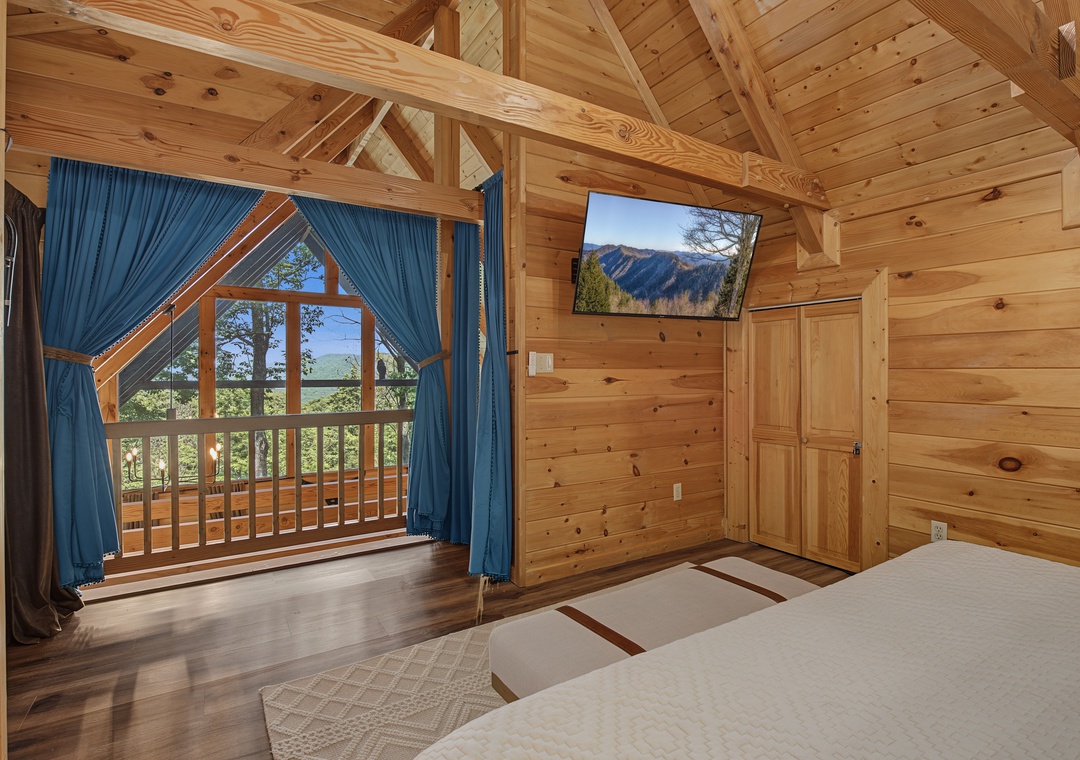 Wake up to stunning mountain views framed by soaring wood beams and cathedral ceilings. Your private balcony invites you to step outside and breathe in the fresh air.