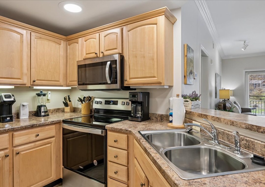 Your fully equipped kitchen awaits with granite counters, stainless appliances, and everything you need to create delicious home-cooked meals during your stay.