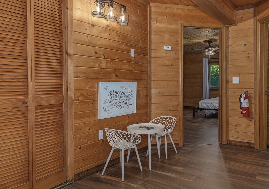 Step into your cozy retreat, where warm wood walls and modern touches create the perfect blend of rustic charm and comfort—your peaceful escape awaits just beyond that inviting doorway.