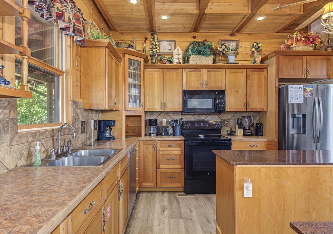 Cook your favorite meals in this fully equipped kitchen with modern appliances, ample counter space, and all the essentials you'll need for a comfortable mountain getaway.