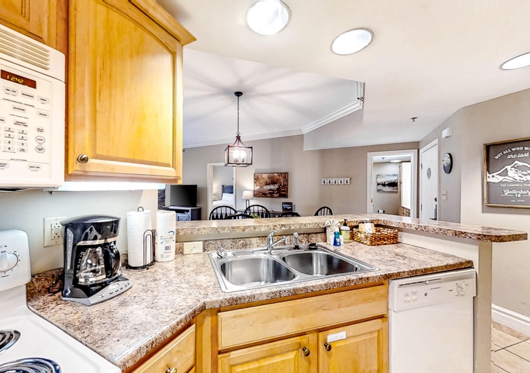 Your well-equipped kitchen features granite countertops, modern appliances, and everything you need to prepare meals during your stay.