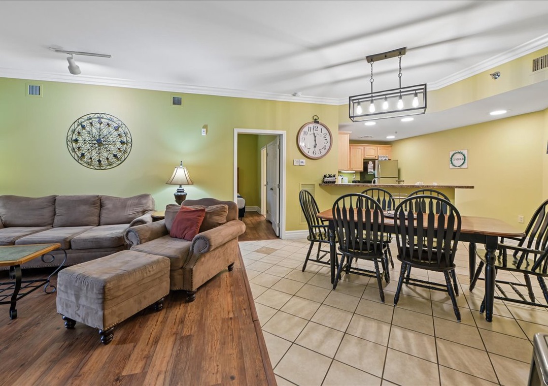 Relax in your spacious open-plan living area with comfortable seating and a fully equipped kitchen for family meals.