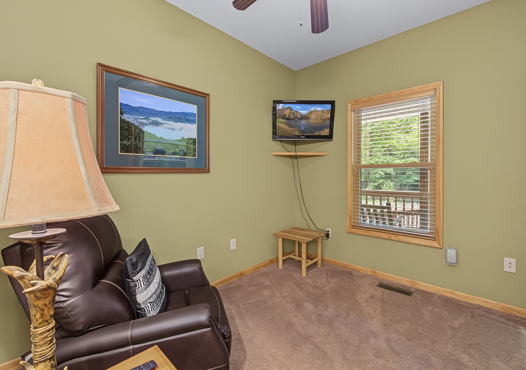 Unwind in your own peaceful corner, where soft leather seating and natural light invite you to relax after exploring the area. Catch up on your favorite shows or simply gaze out at the greenery beyond.