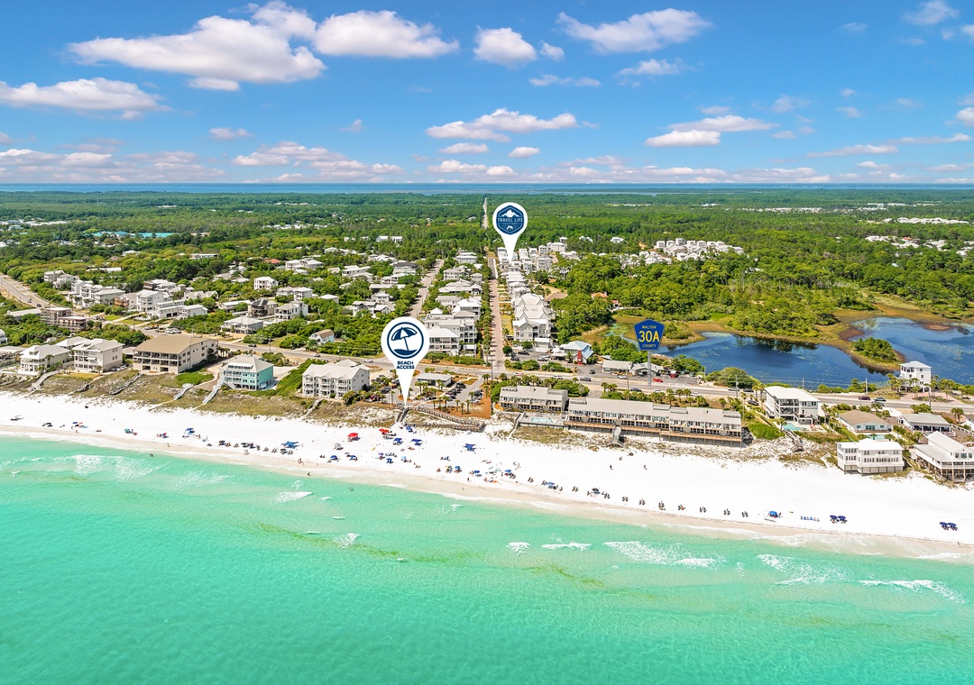 Aerial view of the property located on white-sand beaches along Florida's stunning Emerald Coast, surrounded by natural coastal beauty and waterfront access.