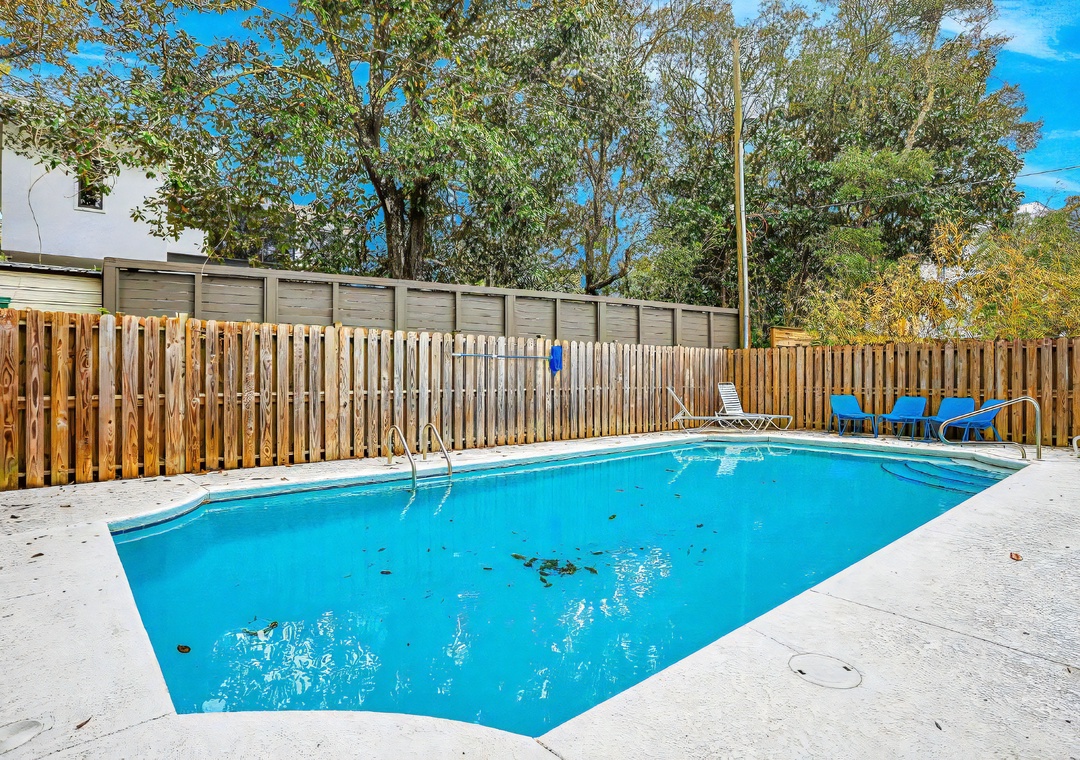 A sunlit pool retreat designed for quiet afternoons and easy lounging.