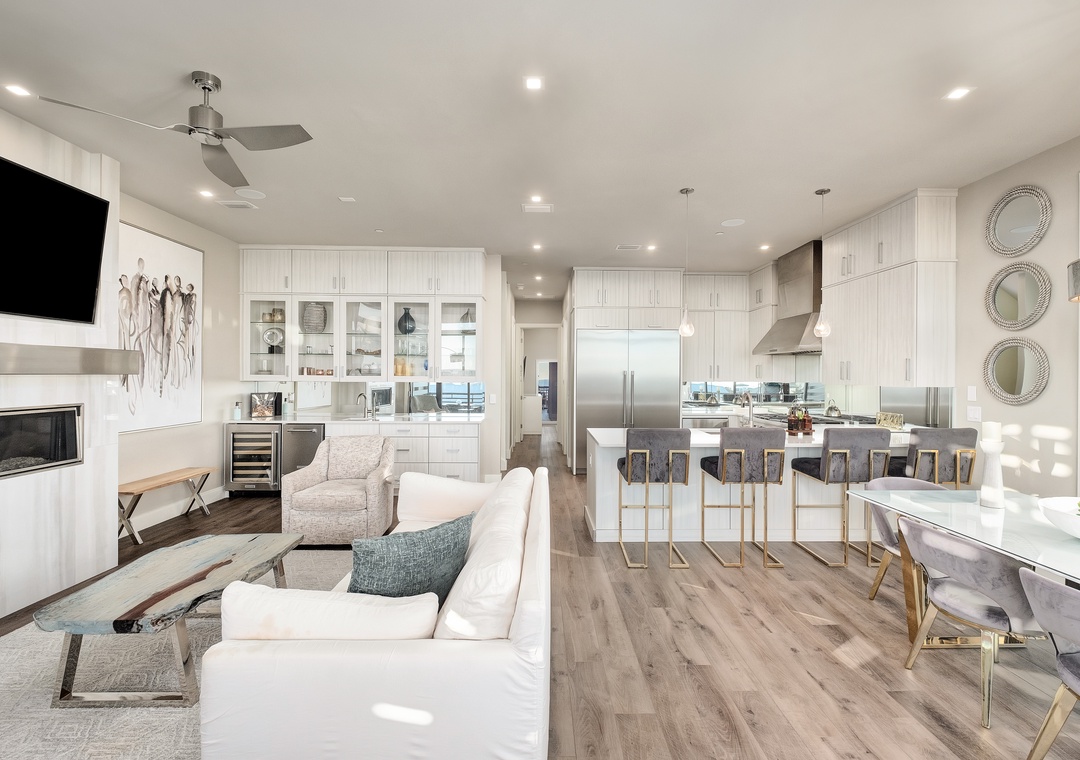 Your spacious open-concept haven features a gourmet kitchen with island seating, cozy living room with fireplace, and seamless flow perfect for entertaining.