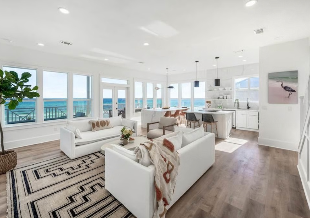 Amazing living room and kitchen area with insane Gulf views