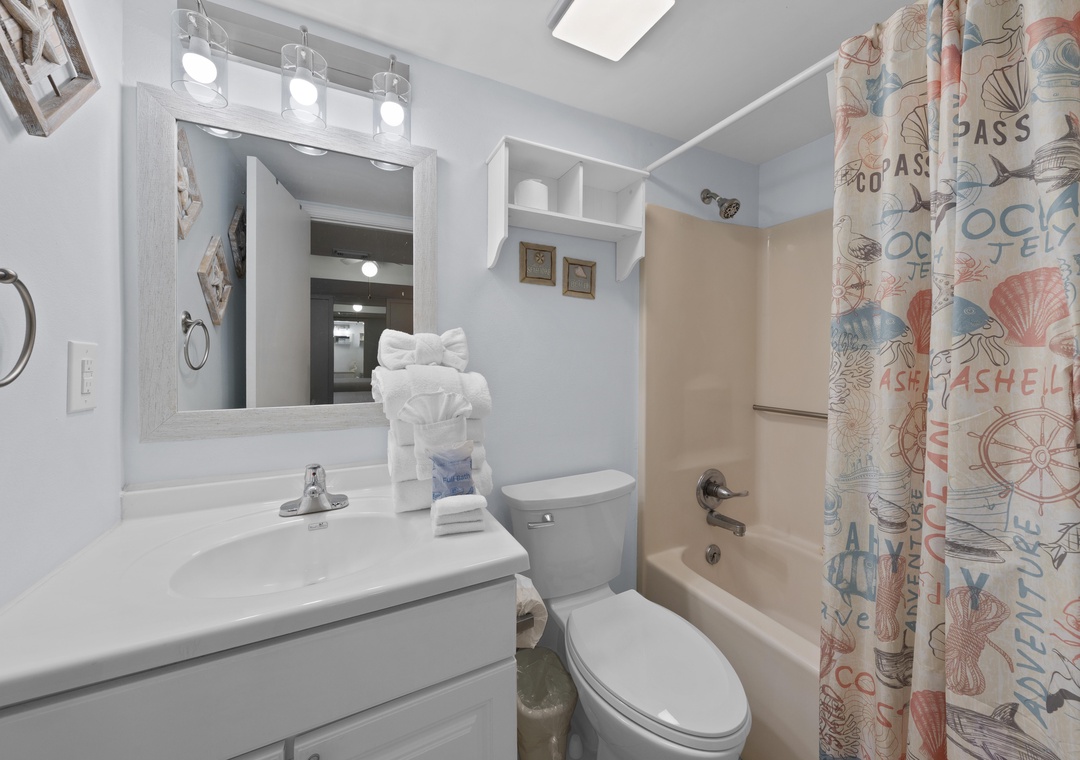 Primary bathroom with tub and shower