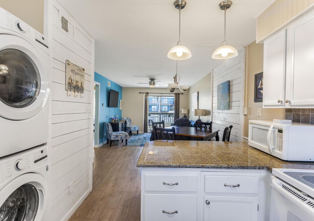 Kitchen open to dining and living room