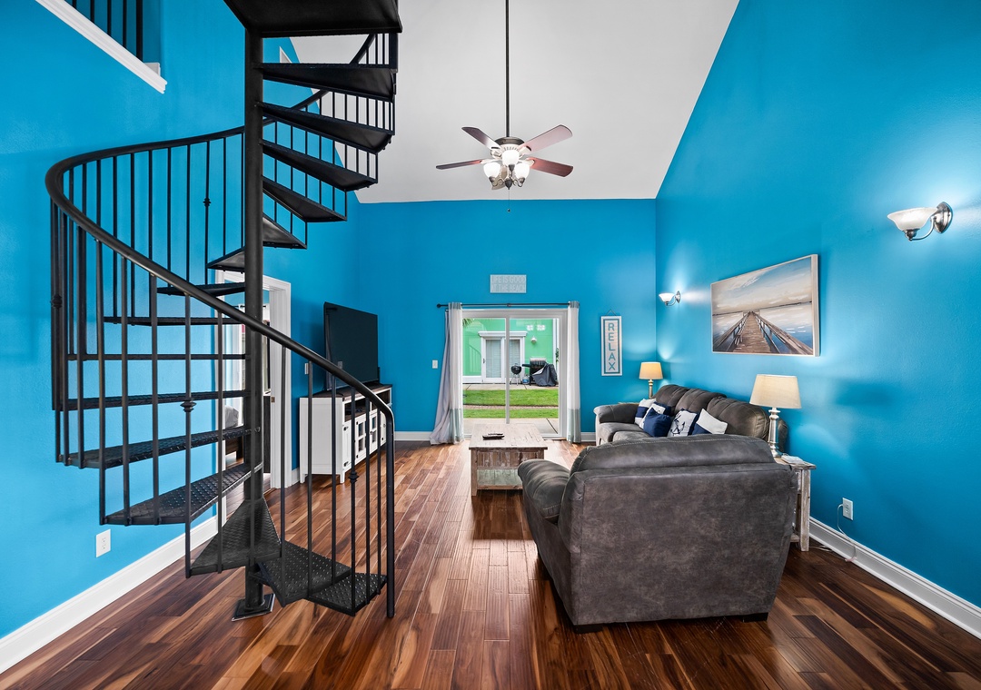 Living room with spiral staircase
