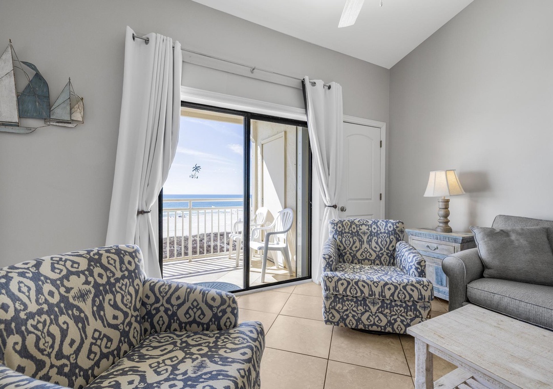 Living room with private balcony access