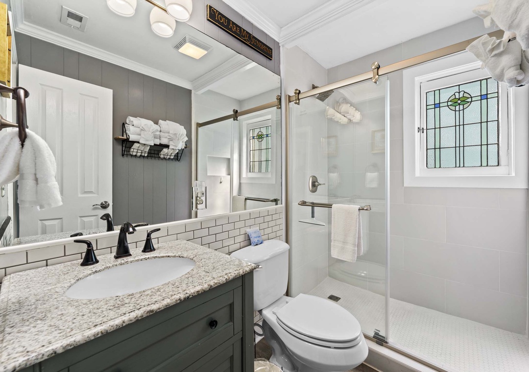 Full bathroom with walk-in shower