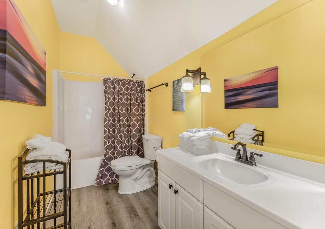 Second floor full bathroom with shower/tub combo