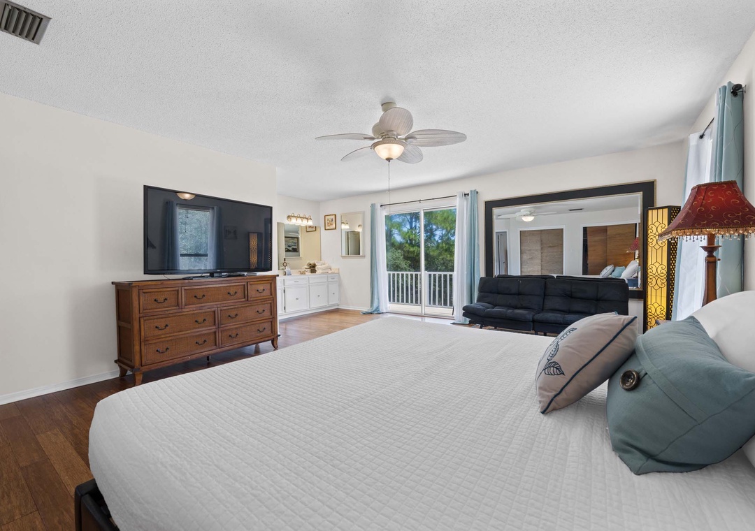 Wind down with your favorite show on the large TV in the primary suite