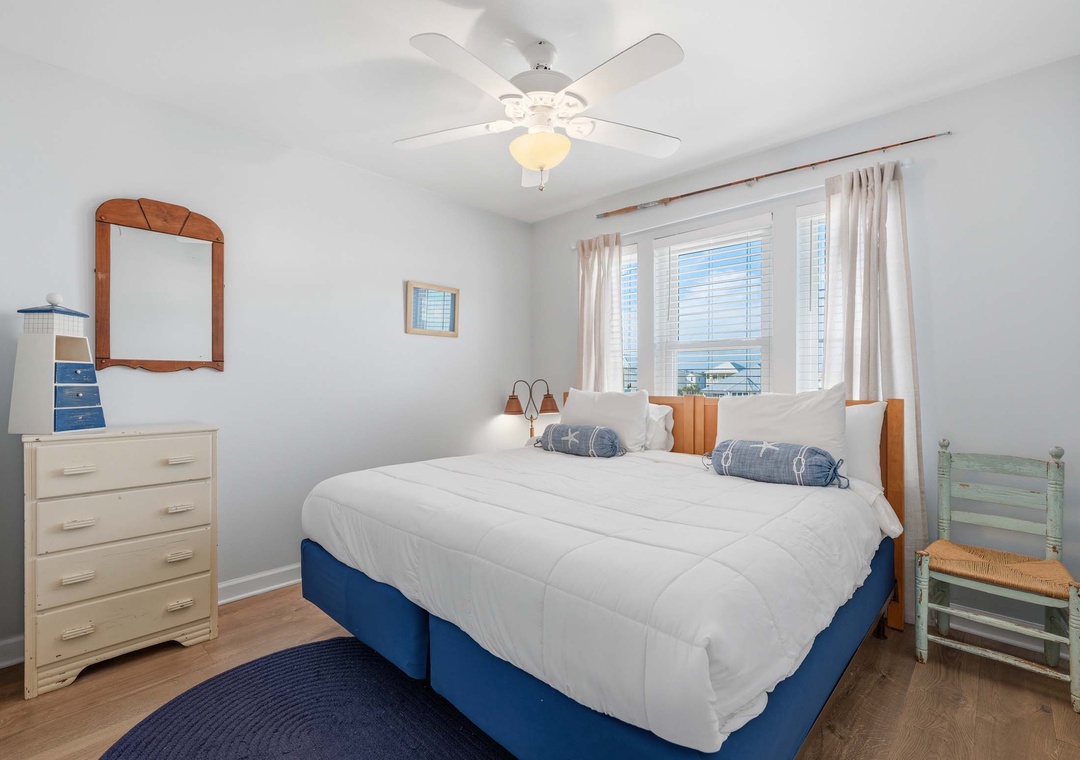 First floor guest bedroom with king bed