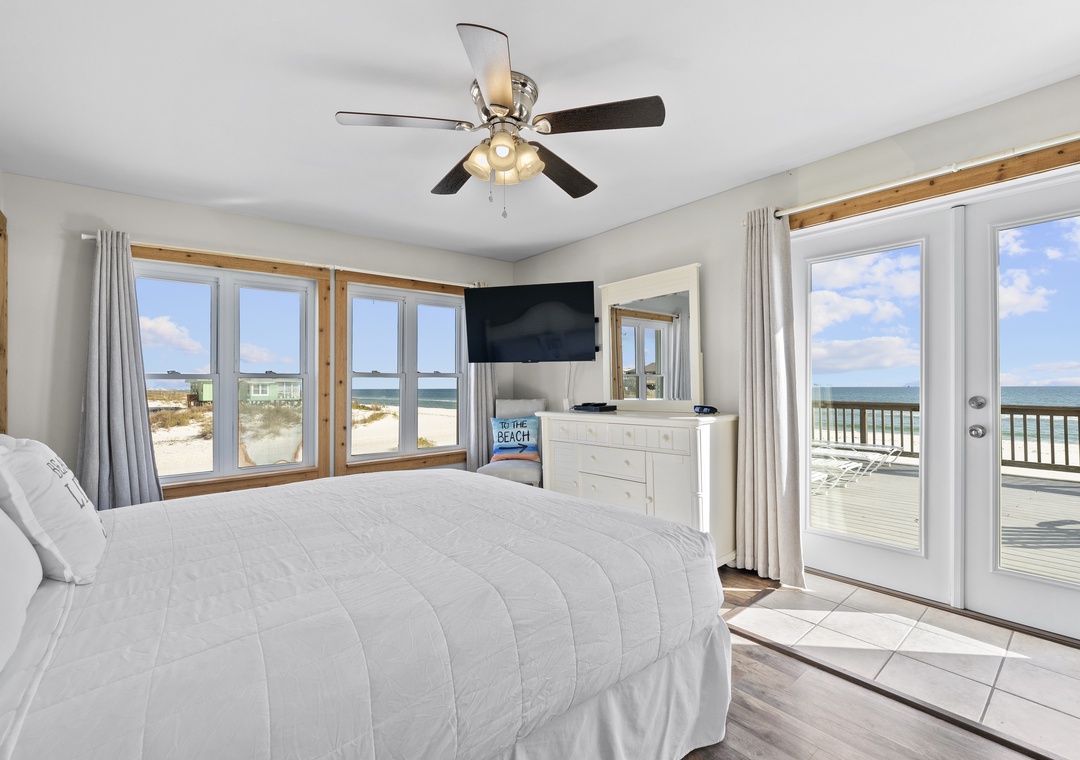 Bedroom 1 with king bed and deck access