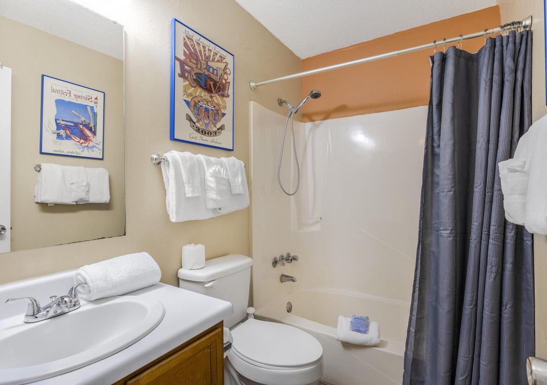 Guest bathroom with tub and shower combo