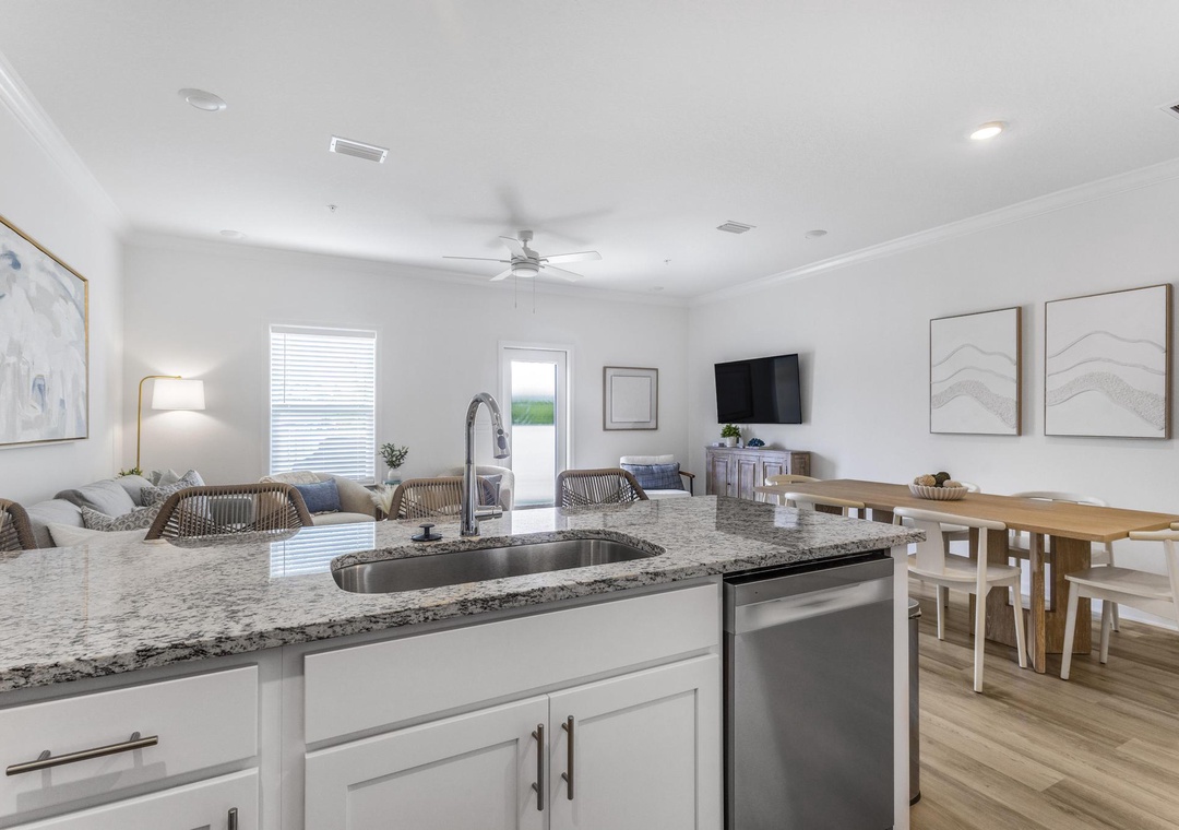 Kitchen with a view of the living room