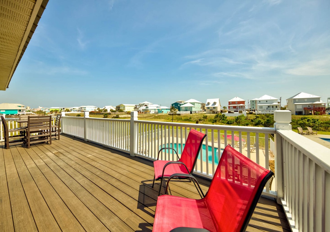 Plenty of seating on the balcony to gather.
