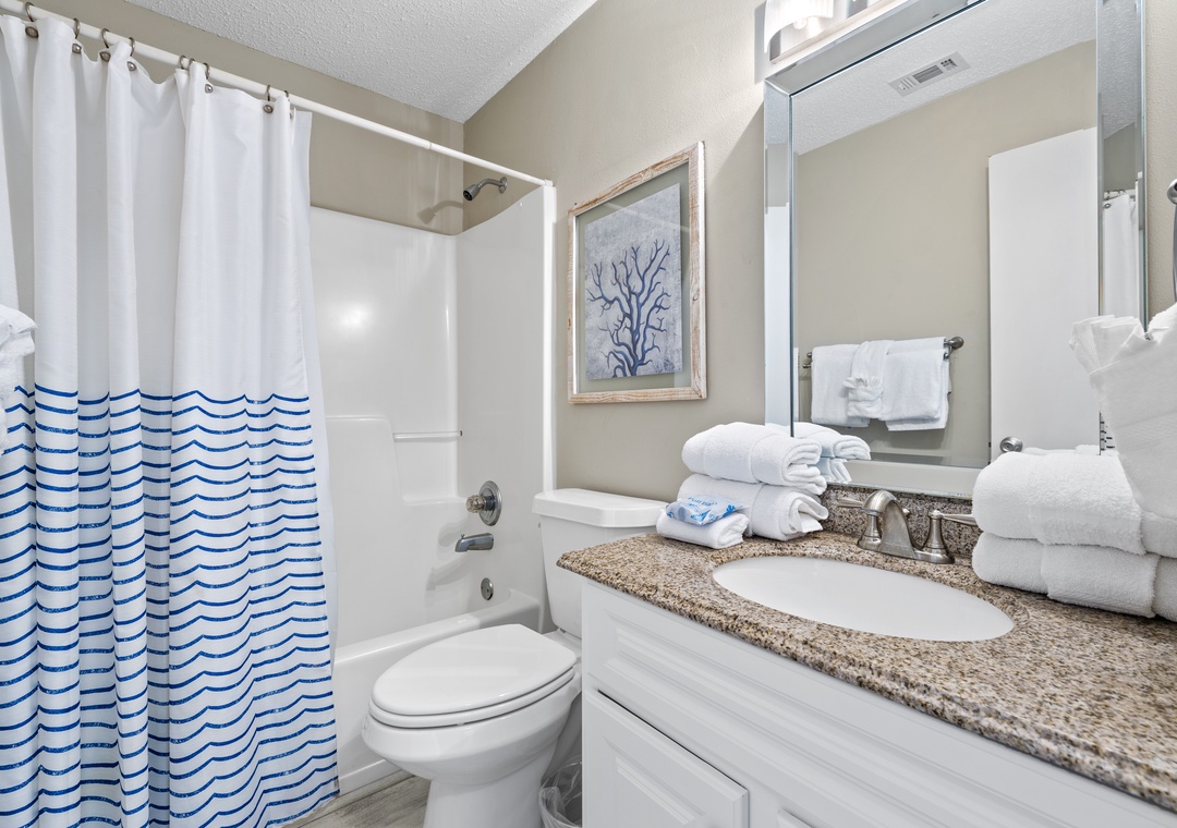 Full bathroom with shower/tub combo