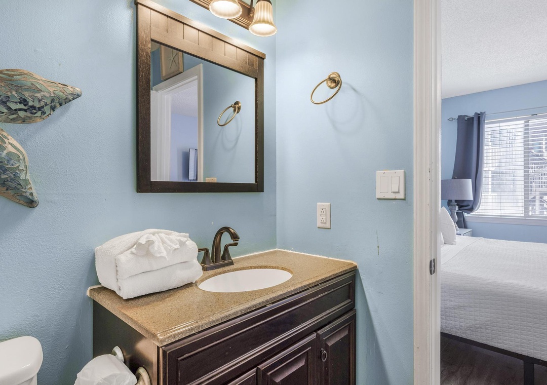 Primary bathroom vanity and mirror