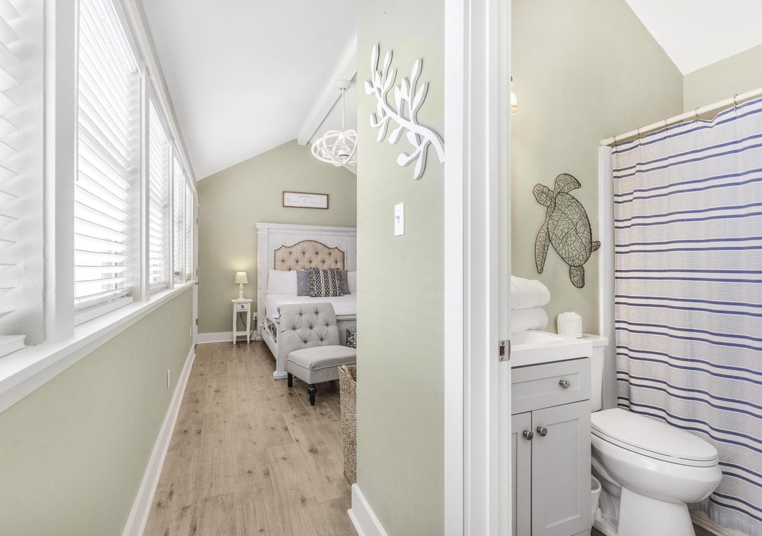 Primary bedroom with ensuite bathroom