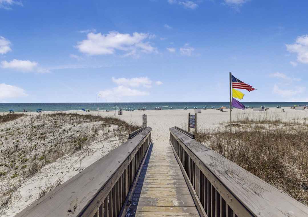 Just steps to the white sand beach