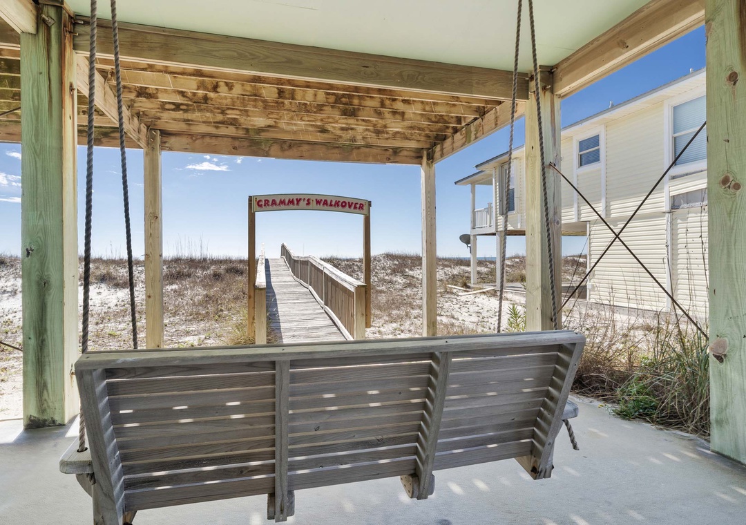 Relax on the swing with the beach just steps away