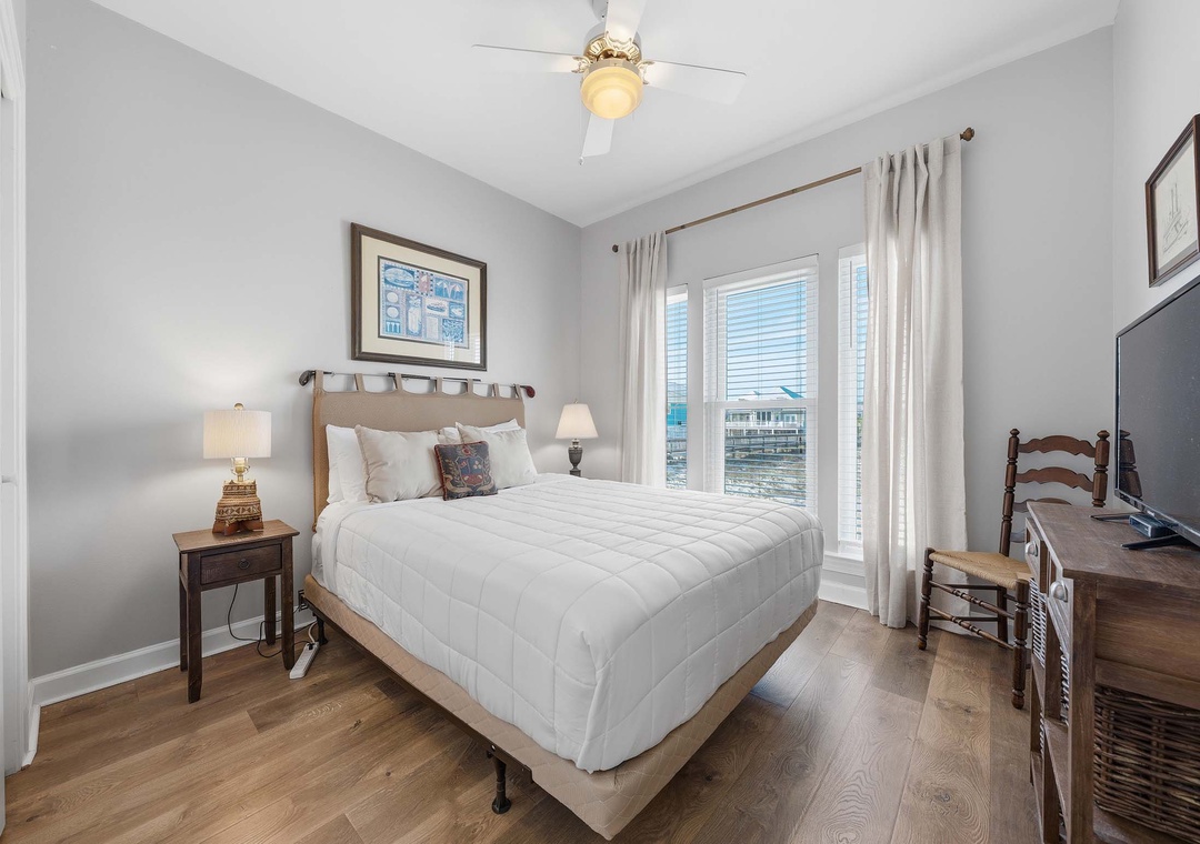 Second floor guest bedroom with queen bed
