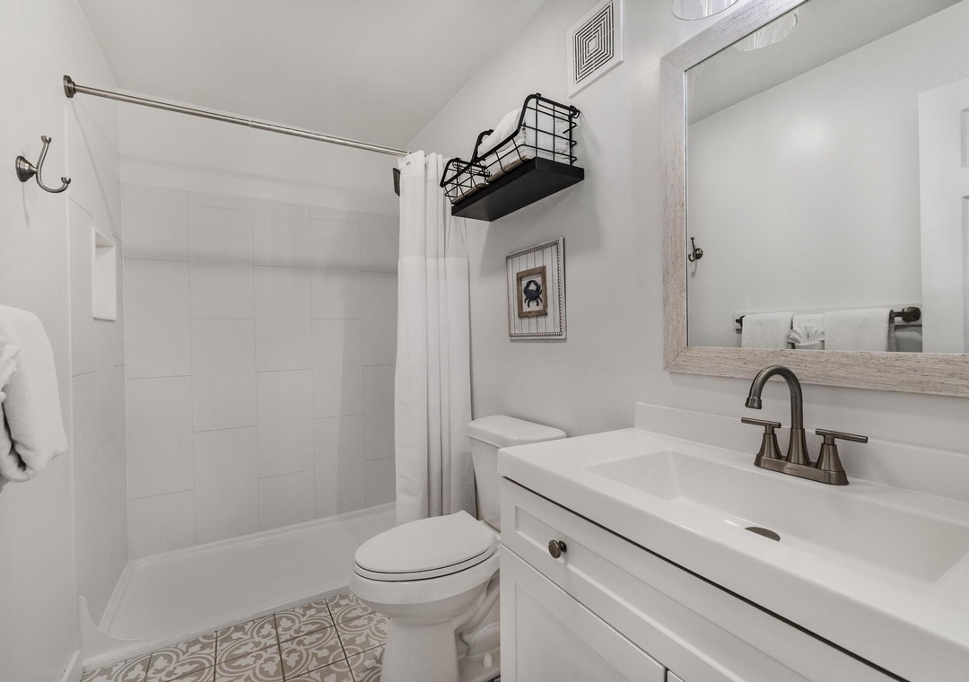 Full bathroom with walk-in shower