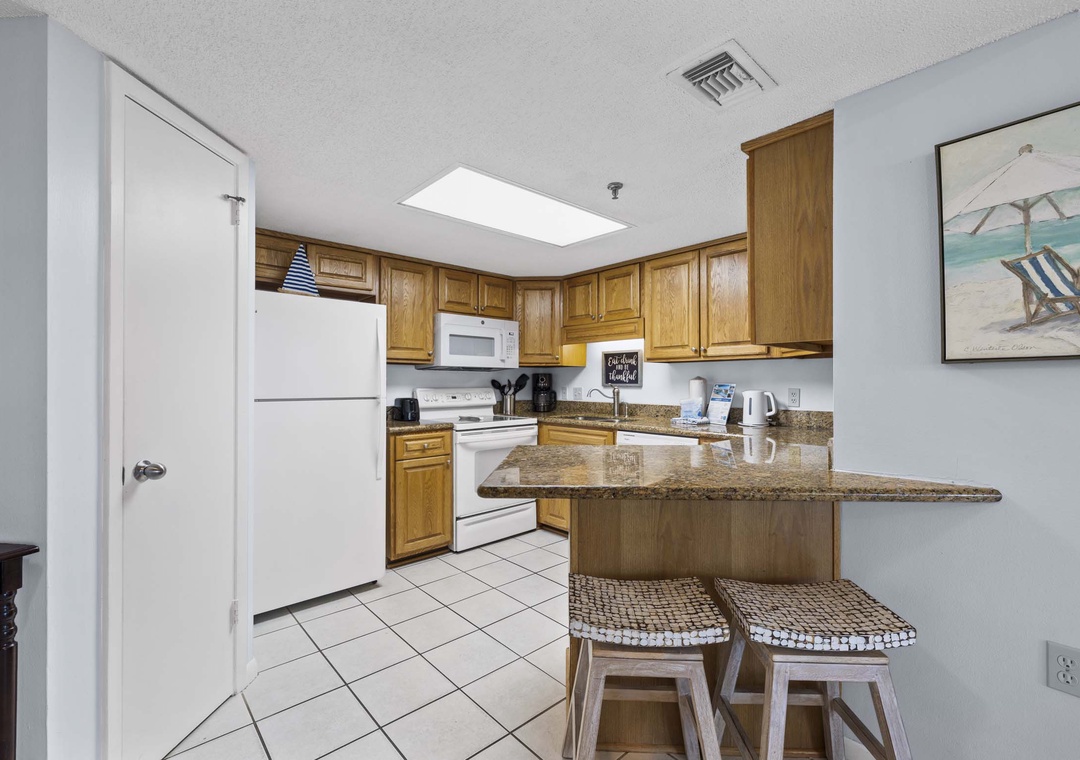 Kitchen with eat-in bar seating