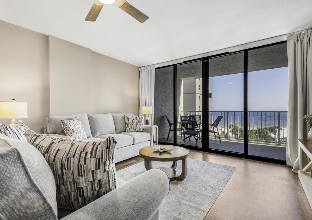 Comfortable living room seating with balcony access