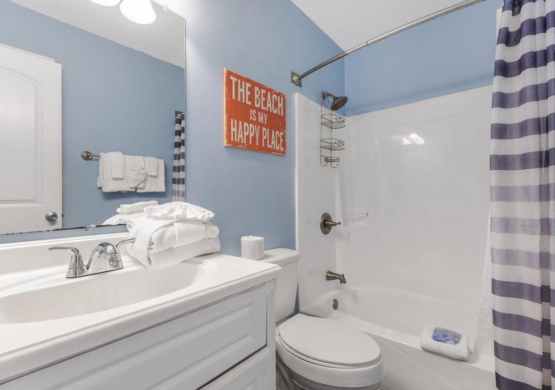 Full bathroom with tub and shower
