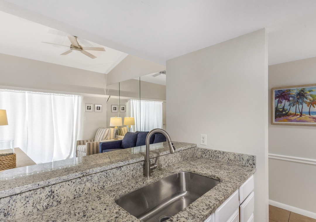 Kitchen with a view into the living room